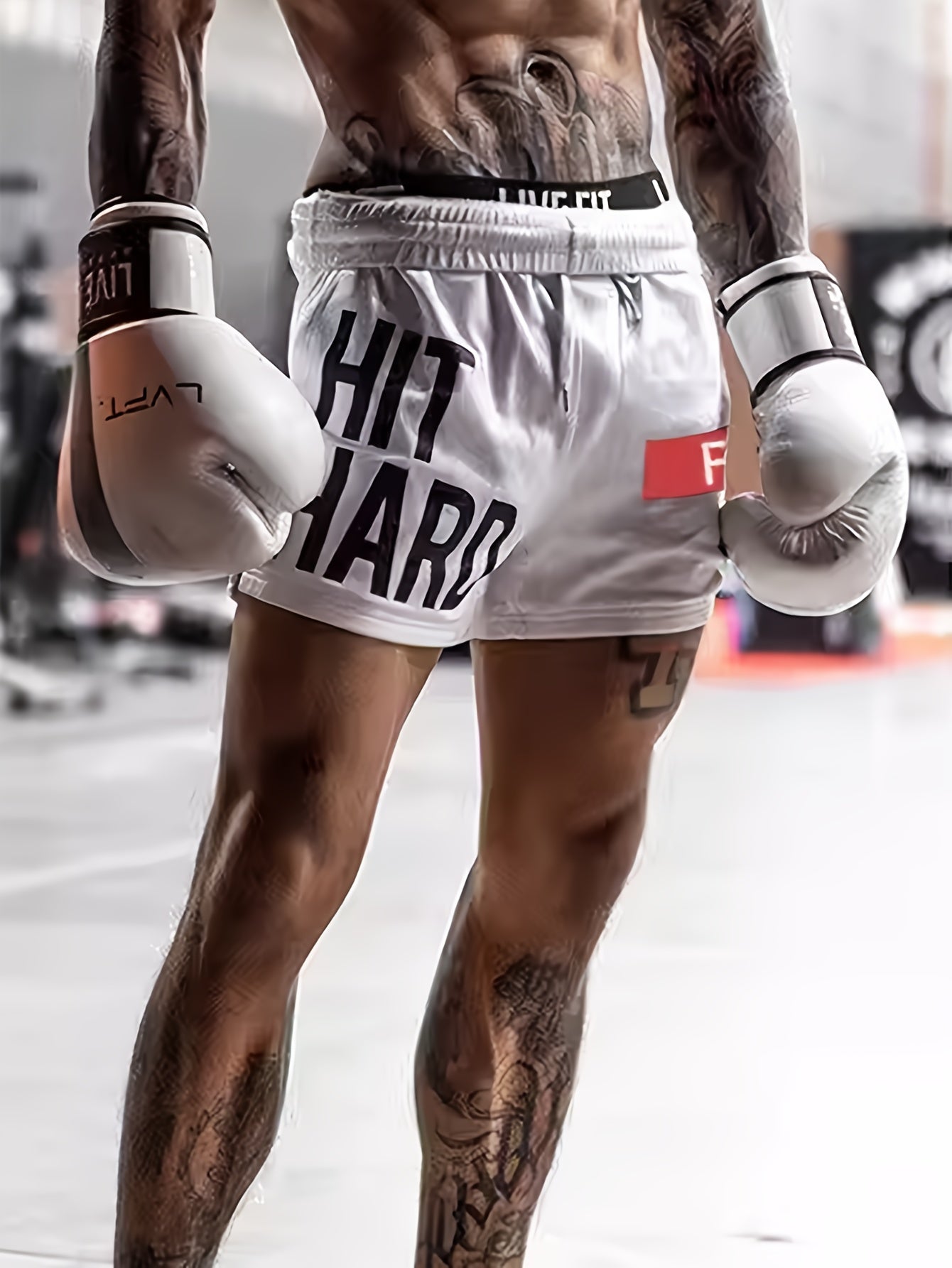 Short de sport homme style basket inscription HIT HARD – Look urbain et performance