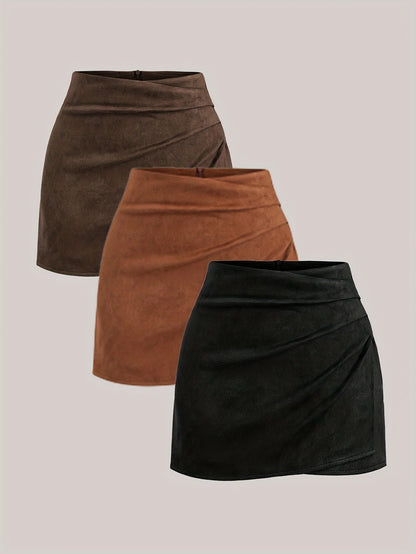 Mini-jupe plissée femme effet suédine marron foncé, camel et noir