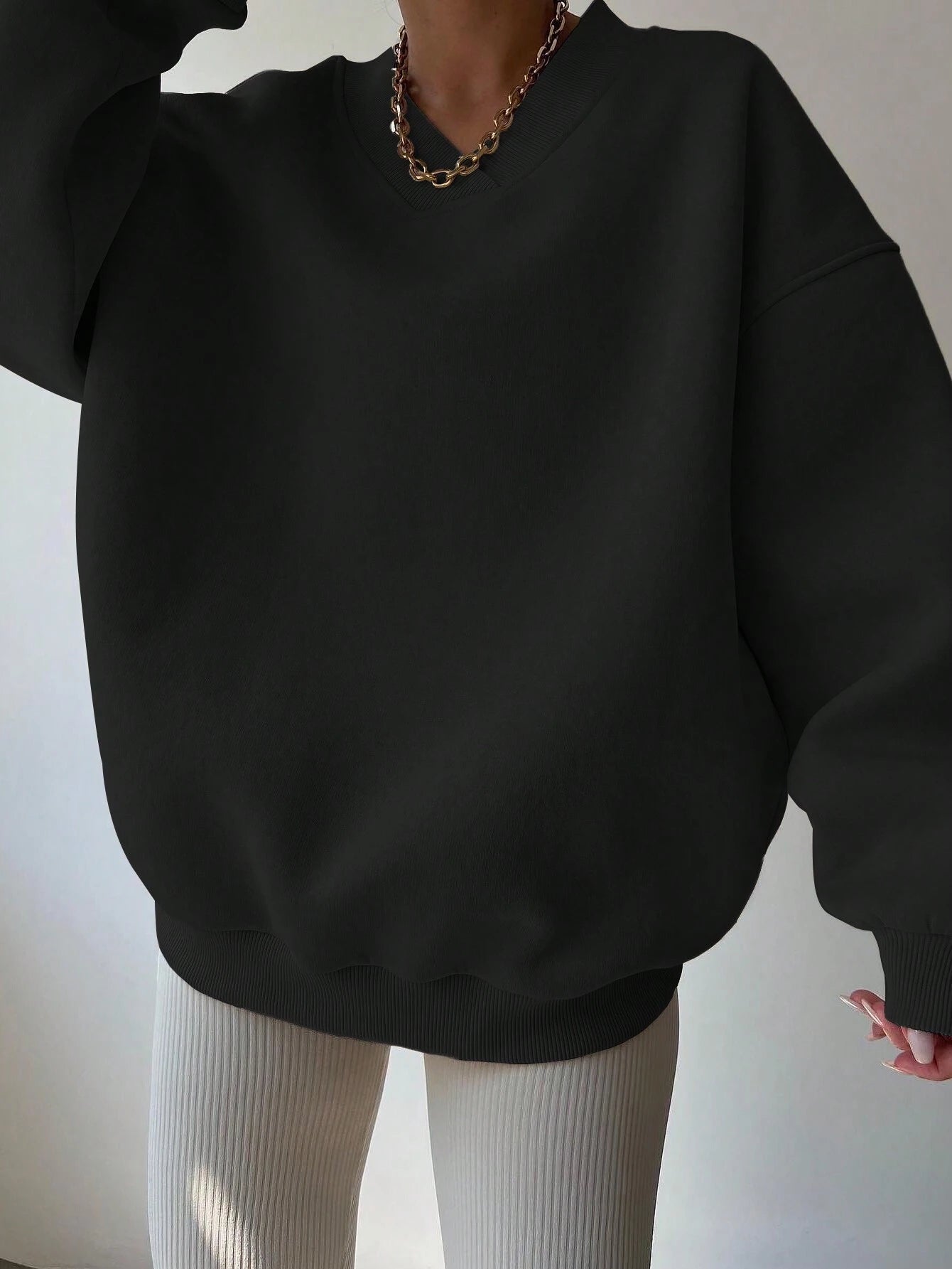 Pull col V femme noir décontracté manches longues