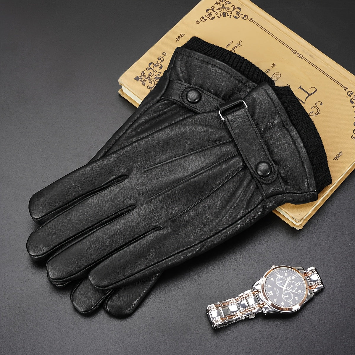 Gants noirs à manchette côtelée et sangle ajustable