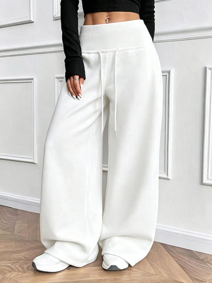 Pantalon large fluide taille haute avec cordon de serrage Femme
