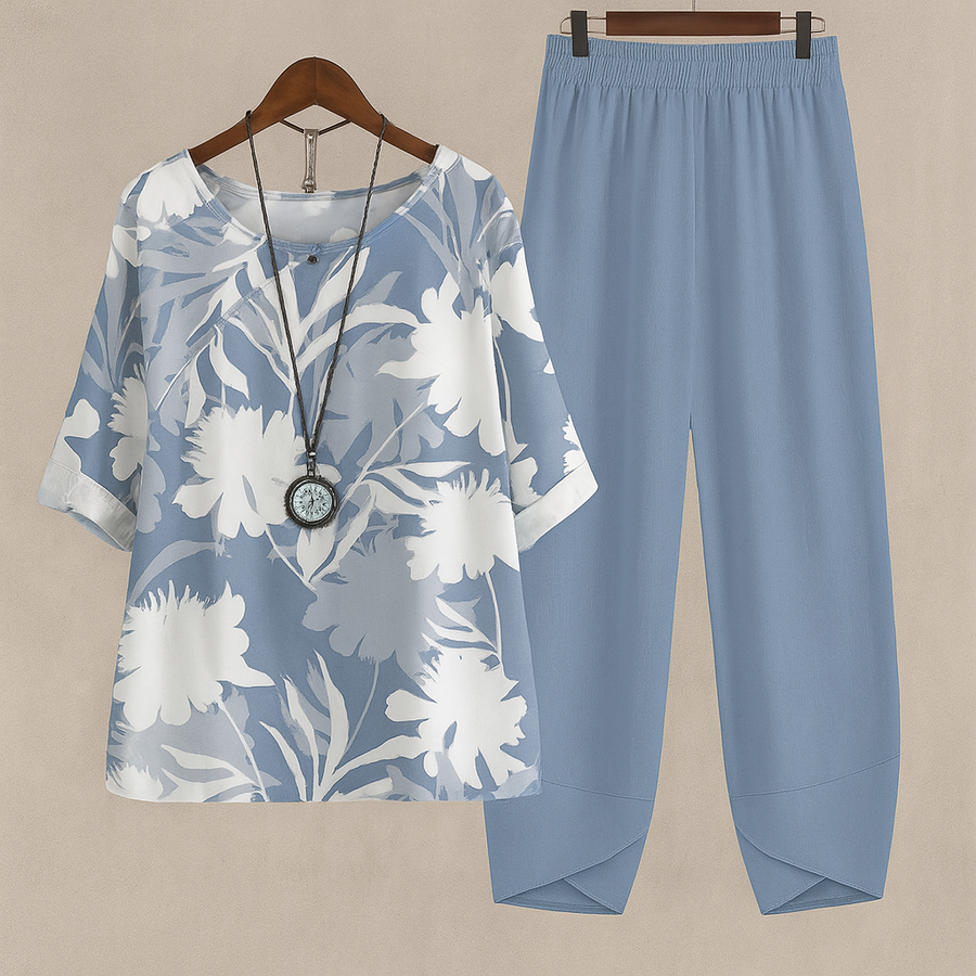 Damen-Zweiteiler aus Bluse und weiter Hose mit gelb-orangefarbenem Blätterprint