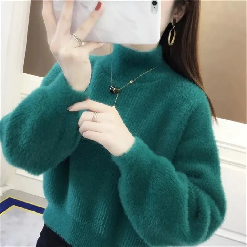 Pull col montant femme manches bouffantes en maille douce couleur unie