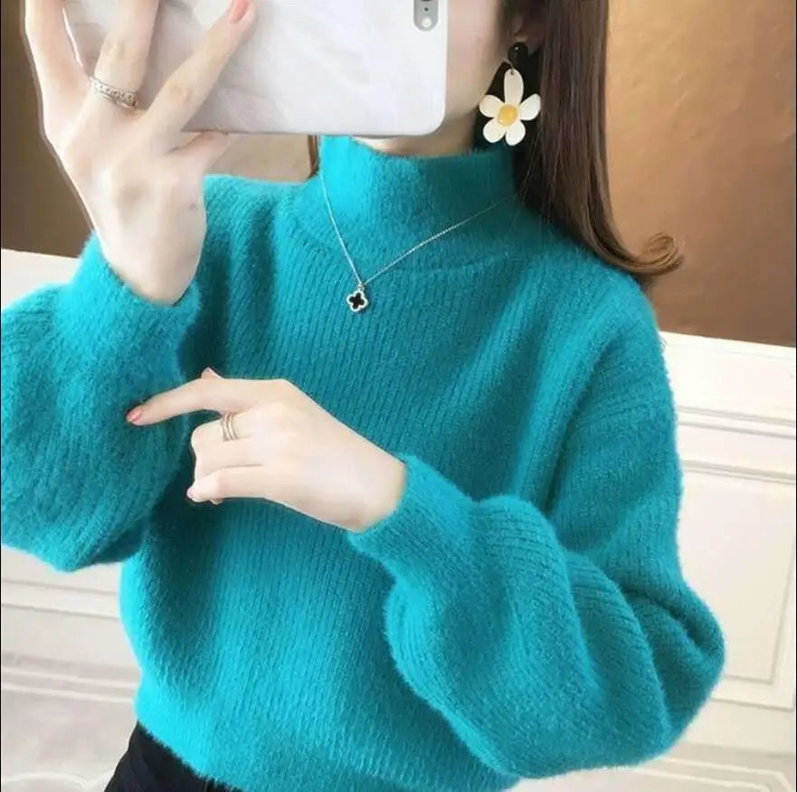 Pull col montant femme manches bouffantes en maille douce couleur unie