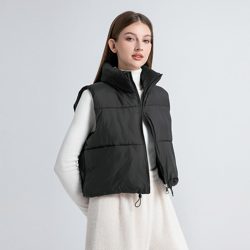 Korte doorgestikte damesbodywarmer zonder mouwen met ritssluiting