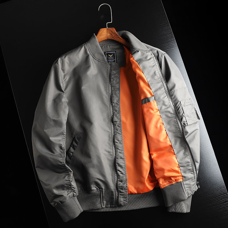 Men's solid-color bomber jacket with zippered pockets