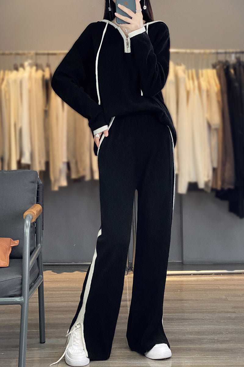 Lässiger Damen-Sportanzug mit Kapuzenoberteil und weiter Hose mit kontrastierendem Reißverschluss