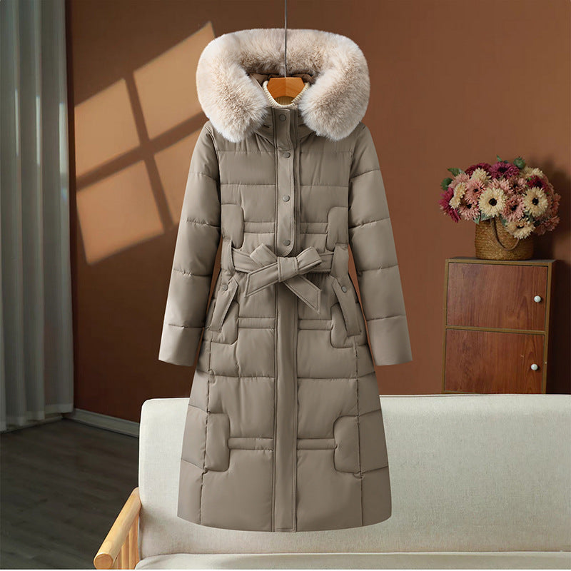 Doudoune longue matelassée Femme avec capuche bordée de fausse fourrure et ceinture