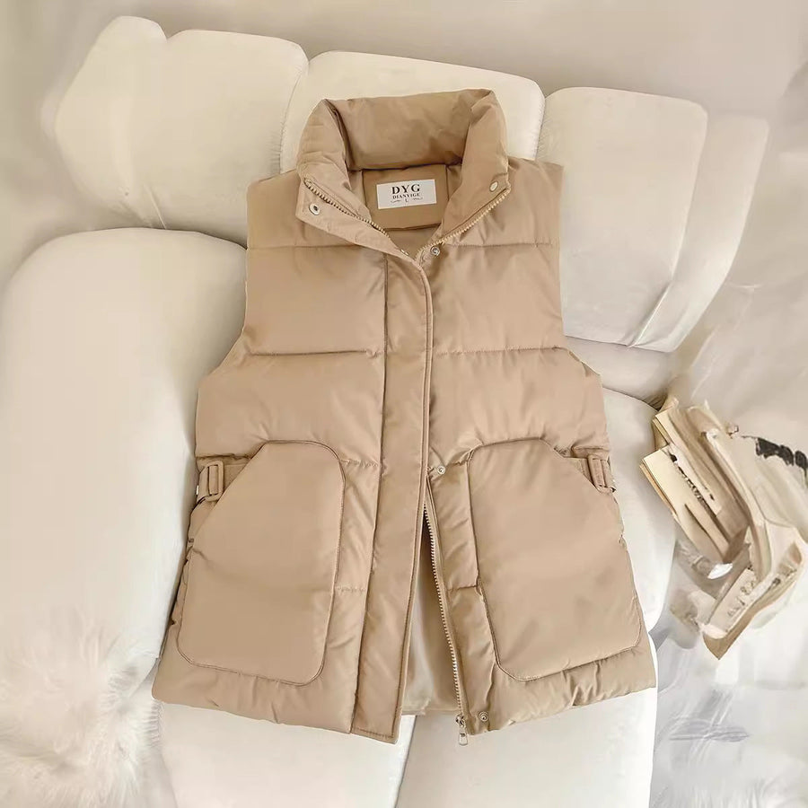 Solid-color quilted puffer vest with a stand collar and side flap pockets