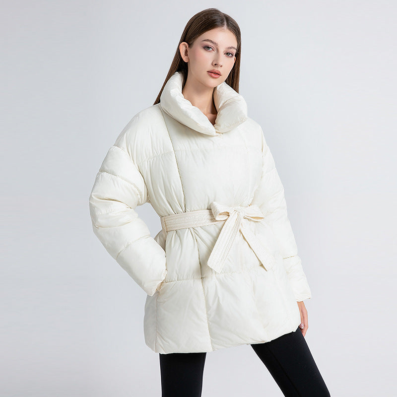 Women's short black quilted puffer coat with stand collar and belt
