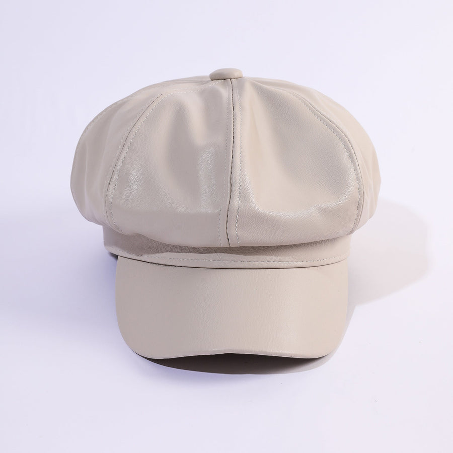 Glanzende newsboypet in retrostijl voor dames