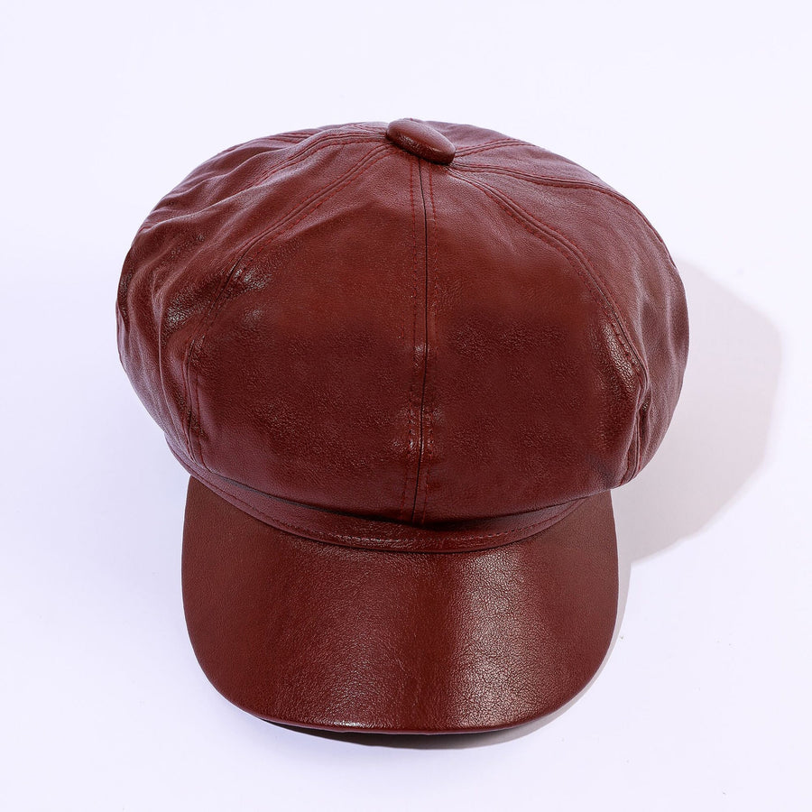 Glanzende newsboypet in retrostijl voor dames