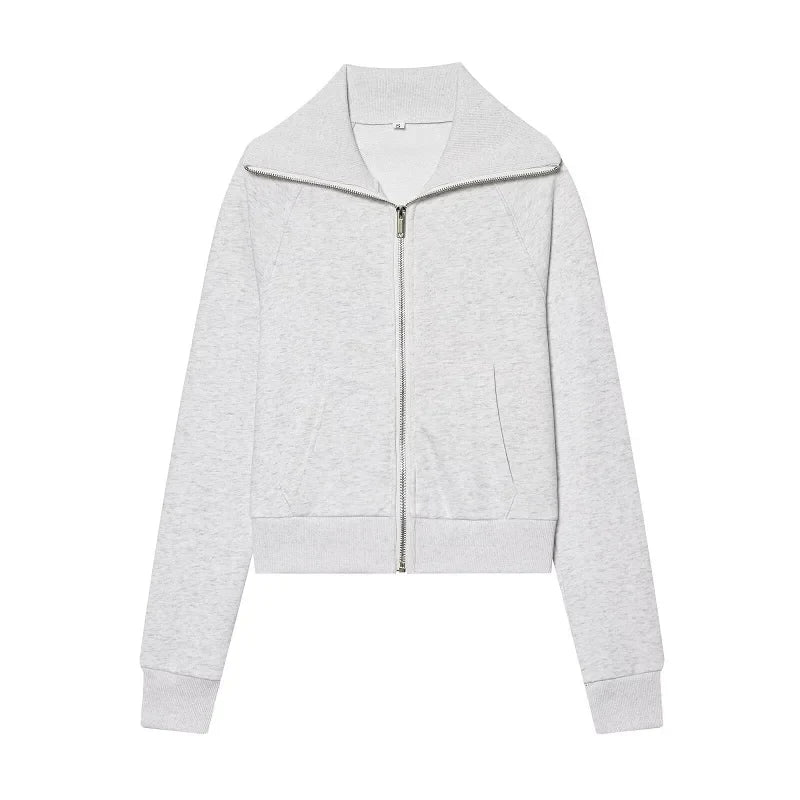Casual sportieve damesoutfit - kort jack met rits en broek met uitlopende pijpen en hoge taille