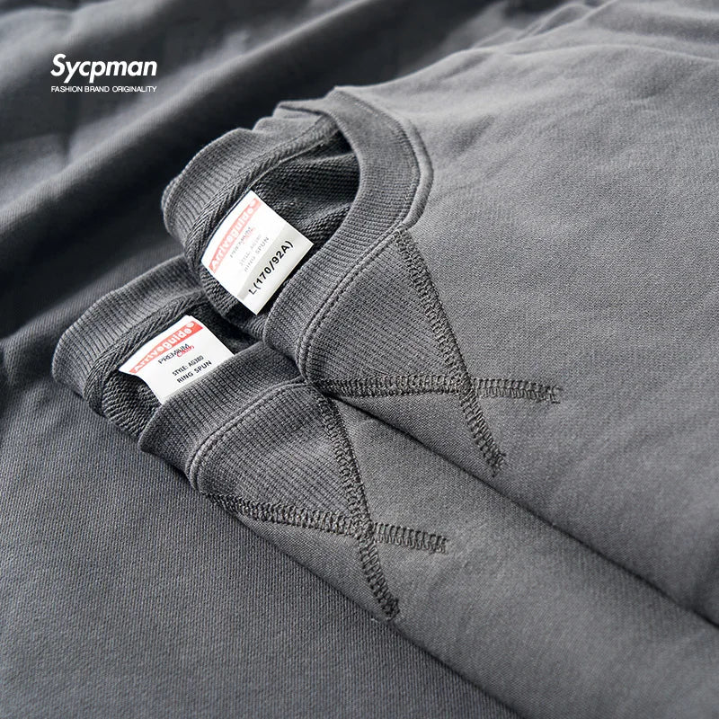 Ensfarvet sweatshirt med rund hals og lange ærmer