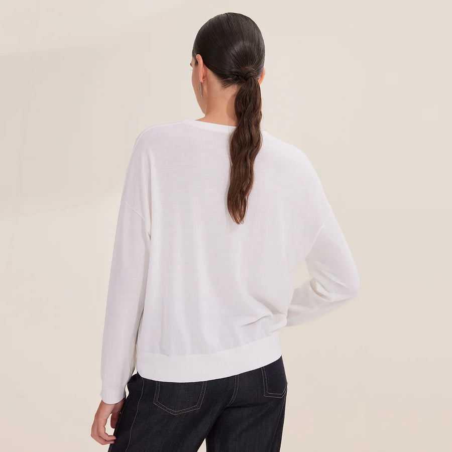 Women's lightweight crew-neck sweater with an embroidered chest pocket
