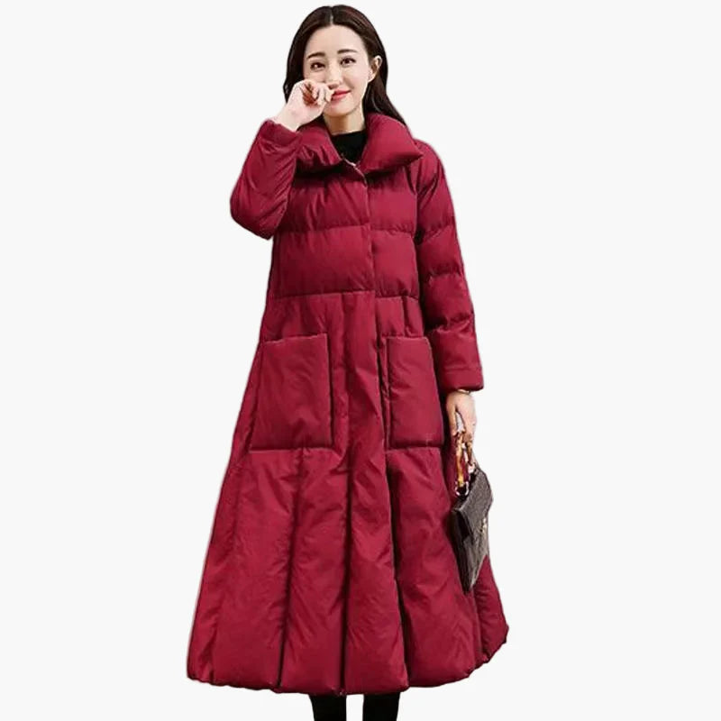 Lang, elegant dunjakke til dame – figursydd og chic vinterstil