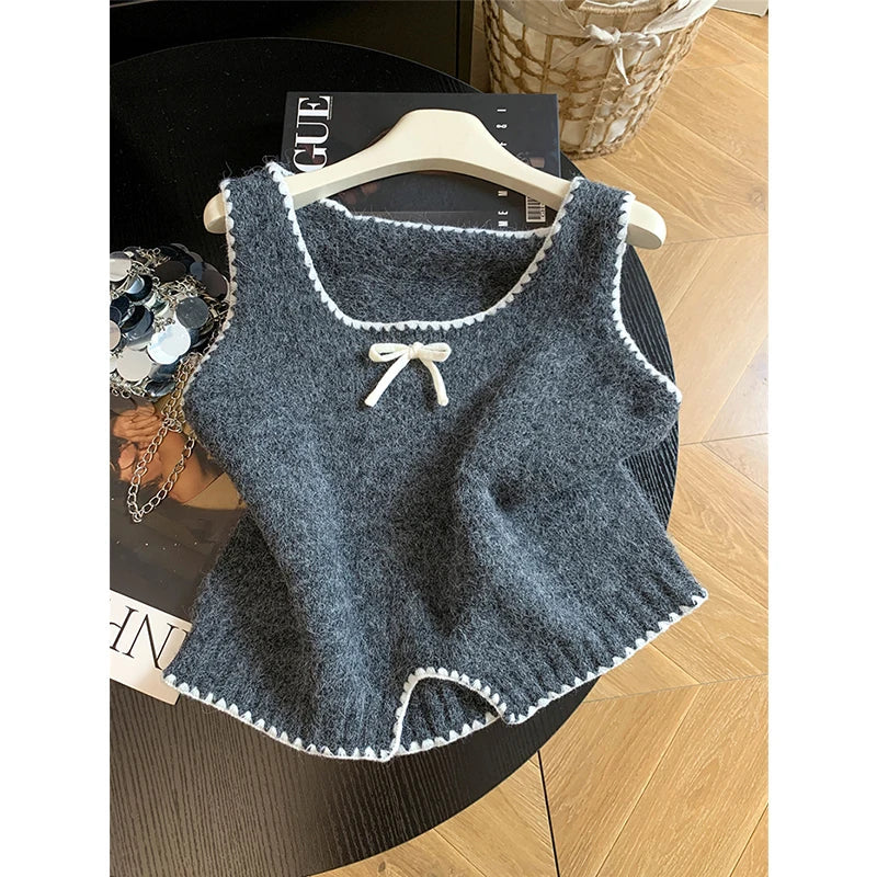 Chaleco de punto suave sin mangas con lazo decorativo
