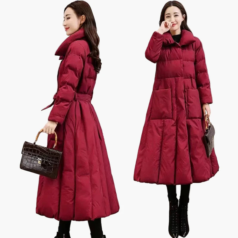 Lang, elegant dunjakke til dame – figursydd og chic vinterstil