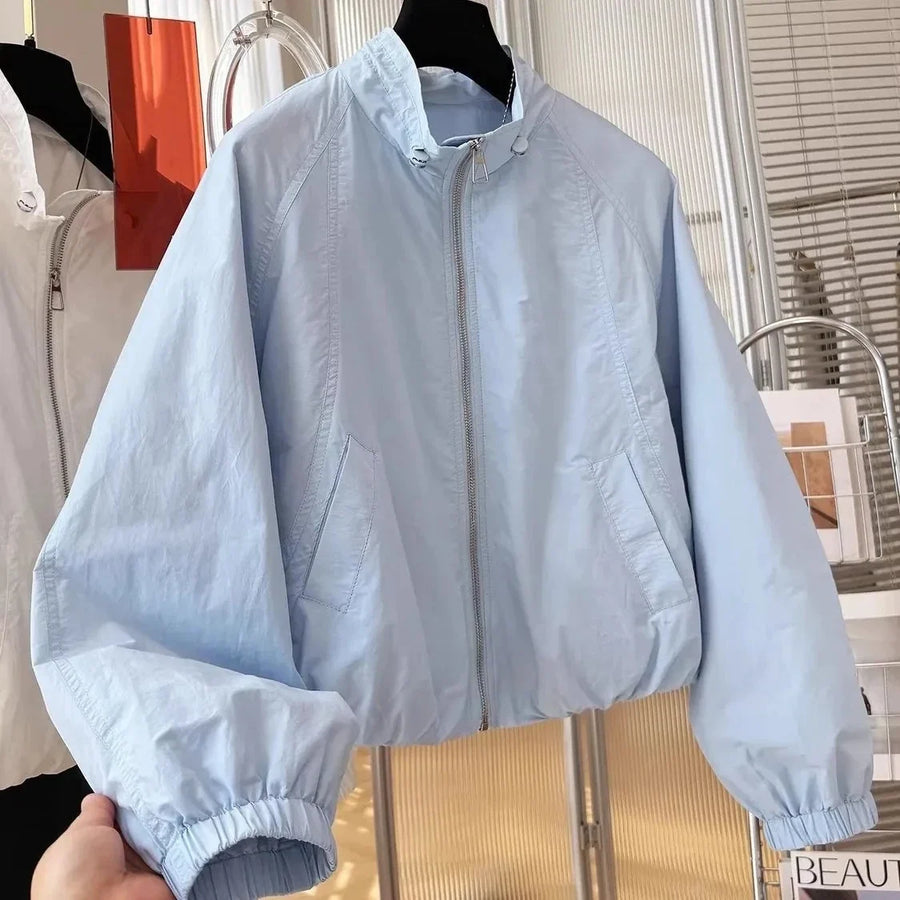 Chaqueta cortavientos ligera para mujer, cuello alto y cierre de cremallera, azul claro o blanca