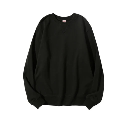 Ensfarvet sweatshirt med rund hals og lange ærmer