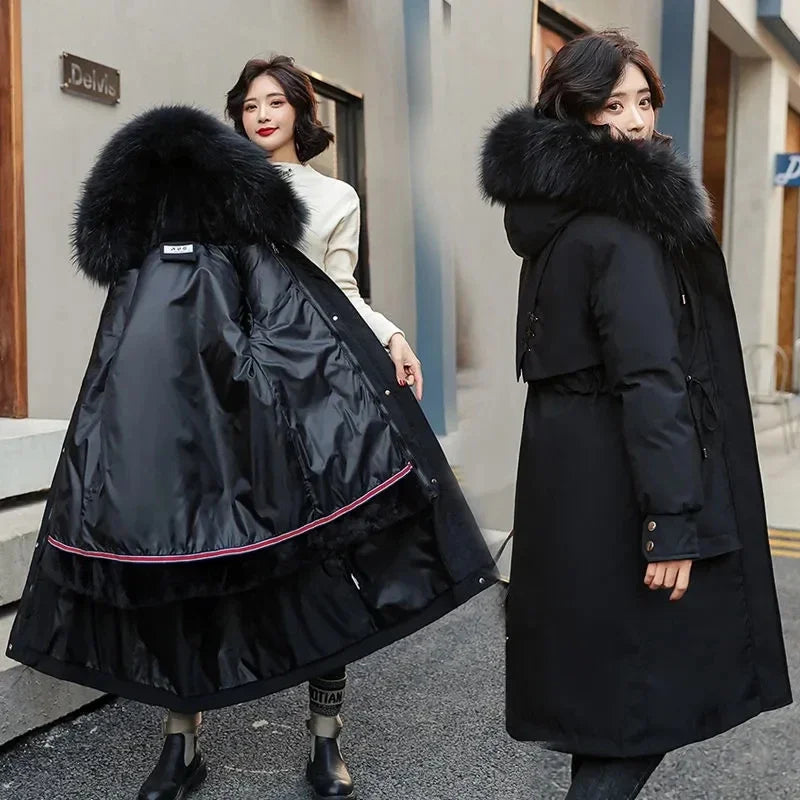 Women's long quilted parka coat with a faux-fur-trimmed hood and removable lining