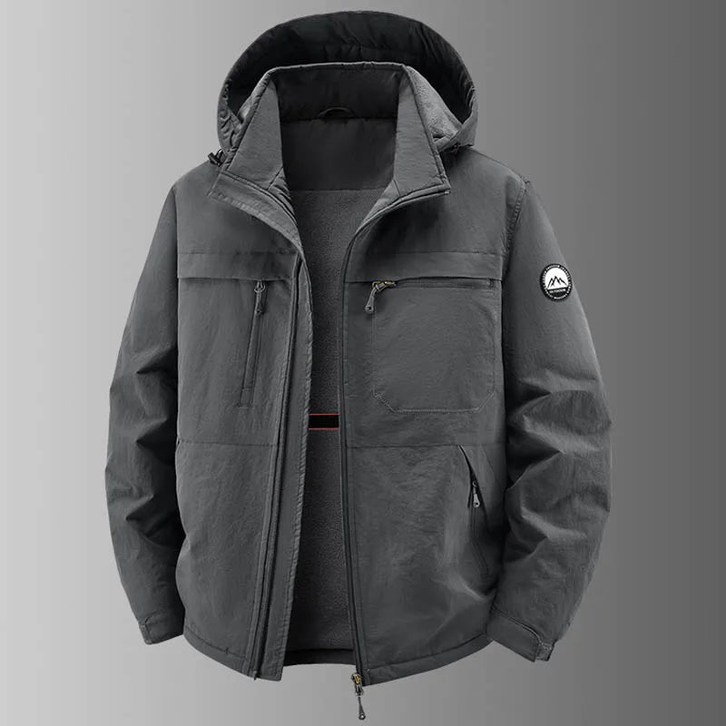 Men's lined hooded jacket with multiple pockets, zip closure, and sleeve badge