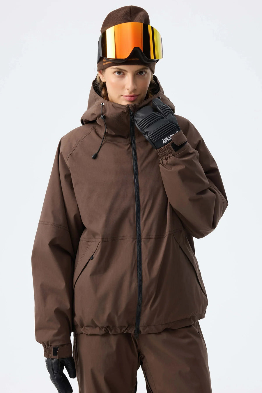 Veste de ski rose pâle imperméable à capuche réglable pour femme