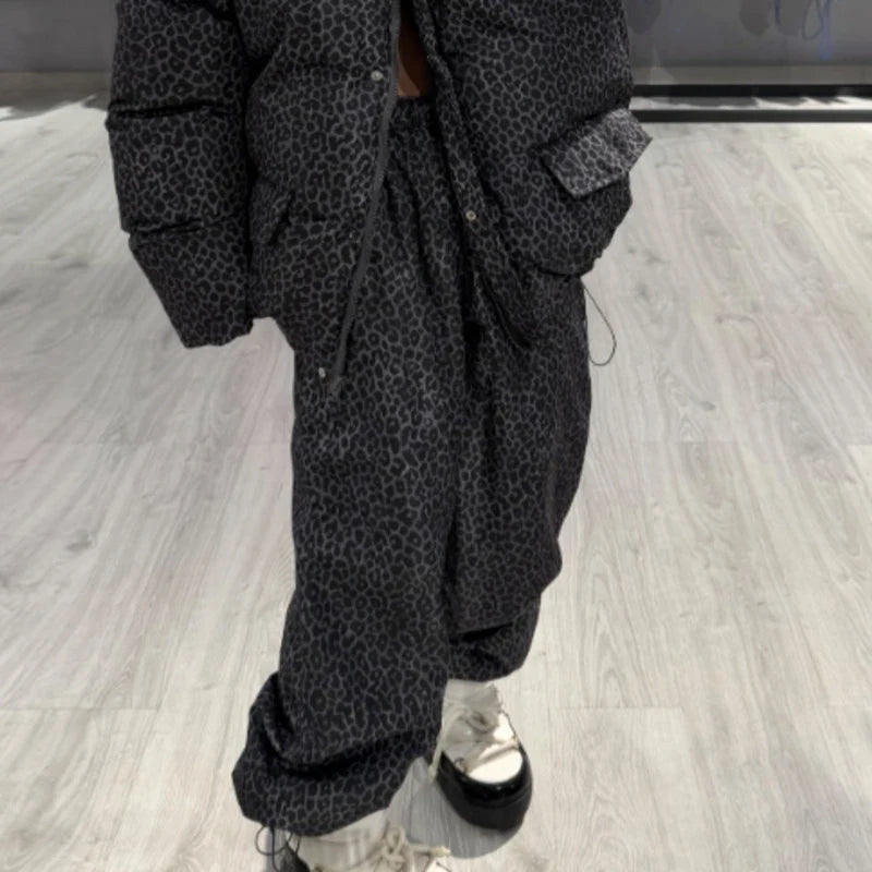 Oversized vatteret dunjakke til kvinder med hætte og print