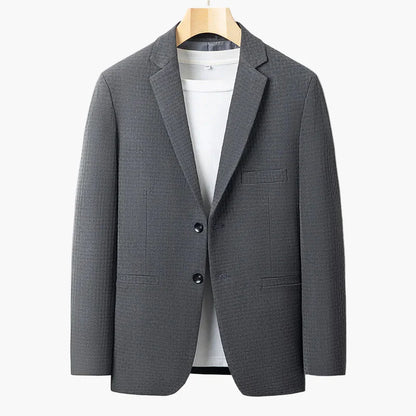 Avslappnad herrblazer i mångsidig urban stil för affärer och vardag