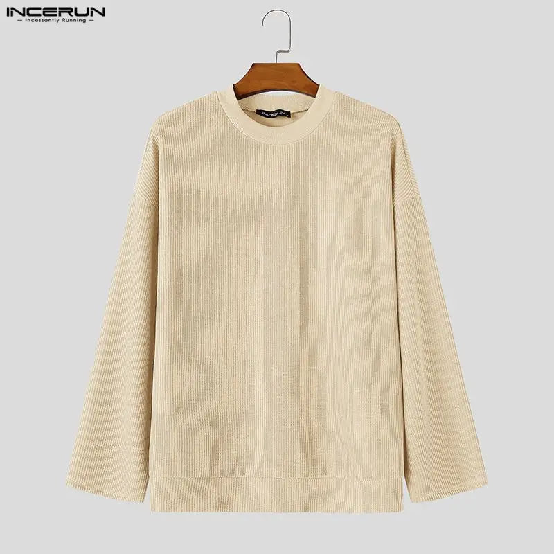 Men's loose-fit black ribbed crew-neck sweater with long sleeves