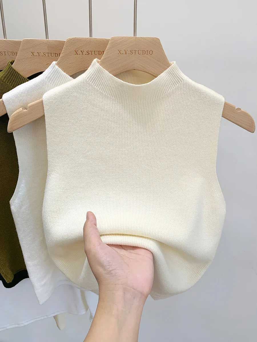 Women's plain knitted sleeveless turtleneck