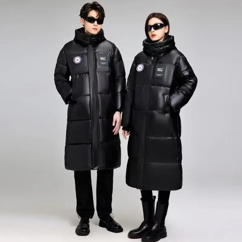 Plumífero largo negro acolchado unisex con capucha