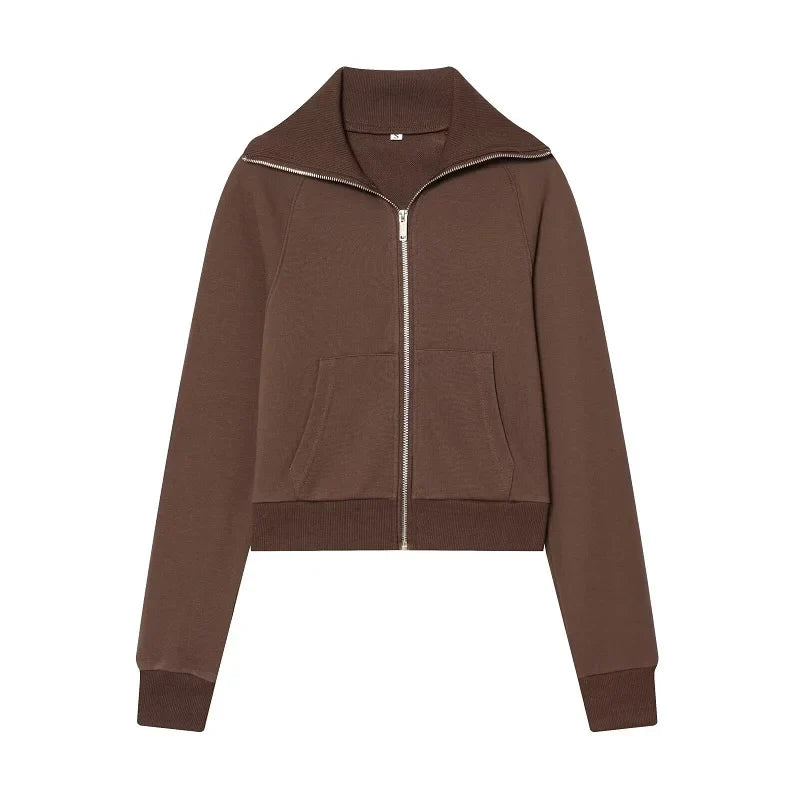 Casual sportieve damesoutfit - kort jack met rits en broek met uitlopende pijpen en hoge taille