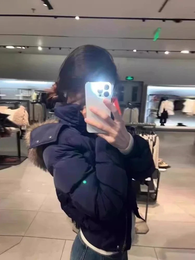 Piumino corto da donna con cappuccio in ecopelliccia blu navy