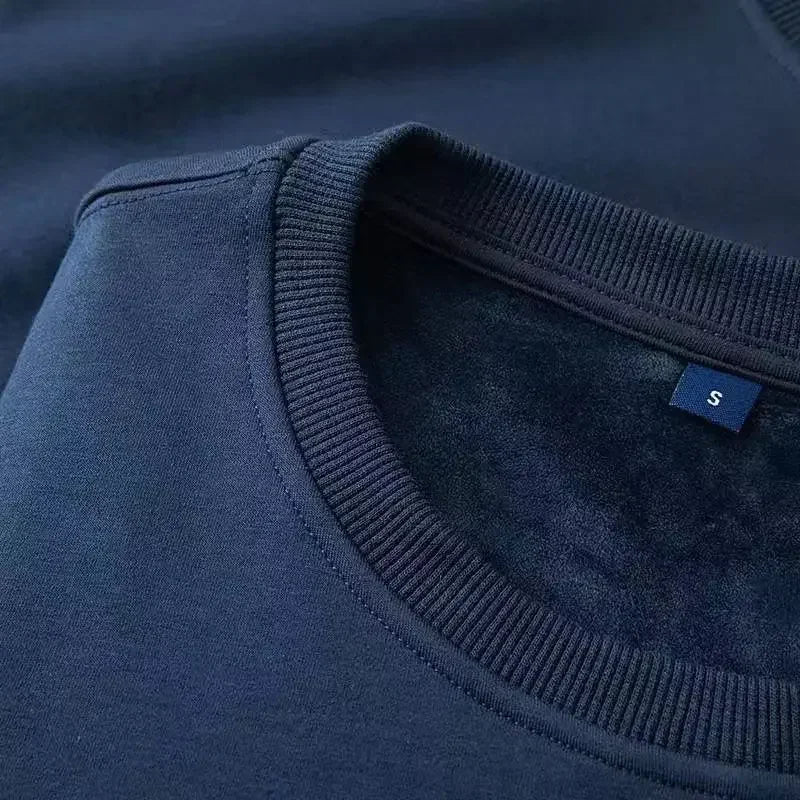 Sweat-shirt col rond doublure douce aspect peluche couleur unie