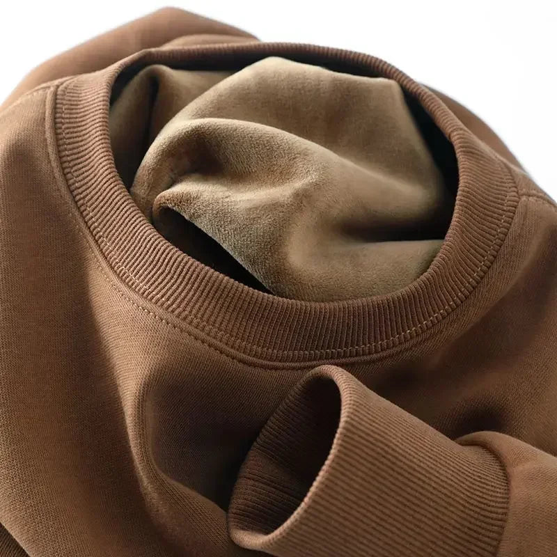 Sweat-shirt col rond doublure douce aspect peluche couleur unie