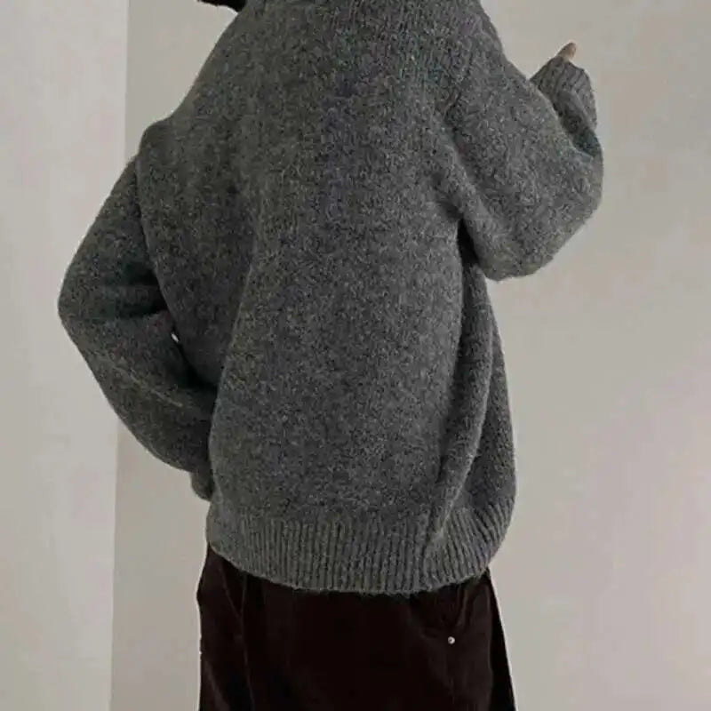 Jersey de hombre de punto gris jaspeado con cuello redondo
