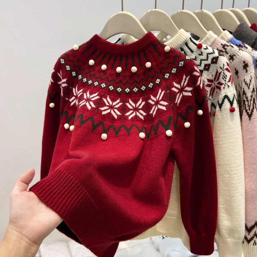 Pull en maille jacquard hivernal à motifs flocons et pompons décoratifs pour femme