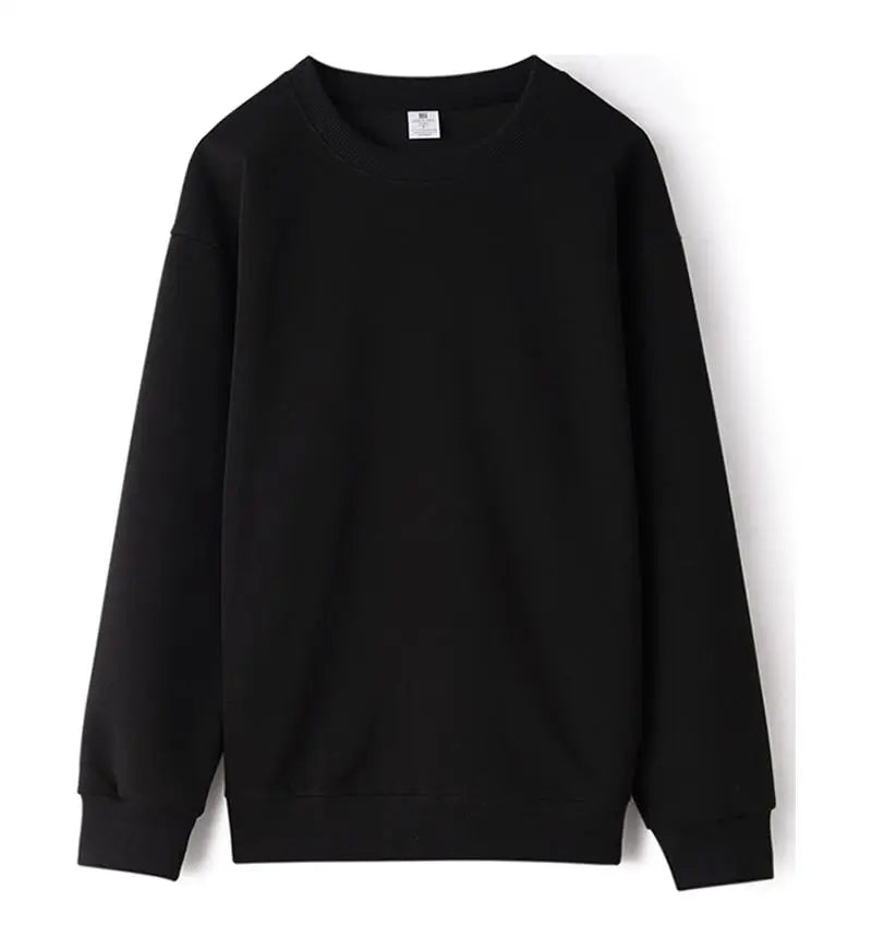 Avslappnad unisex sweatshirt med rund hals, långa ärmar och enfärgad design