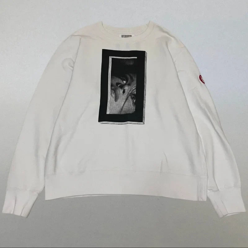 Unisex crew-neck sweatshirt with a graphic design, available in several colors and sizes