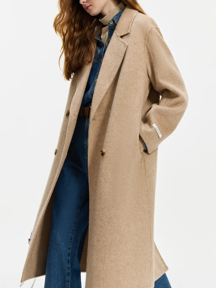 Women's straight-cut, double-breasted wrap coat in a solid color