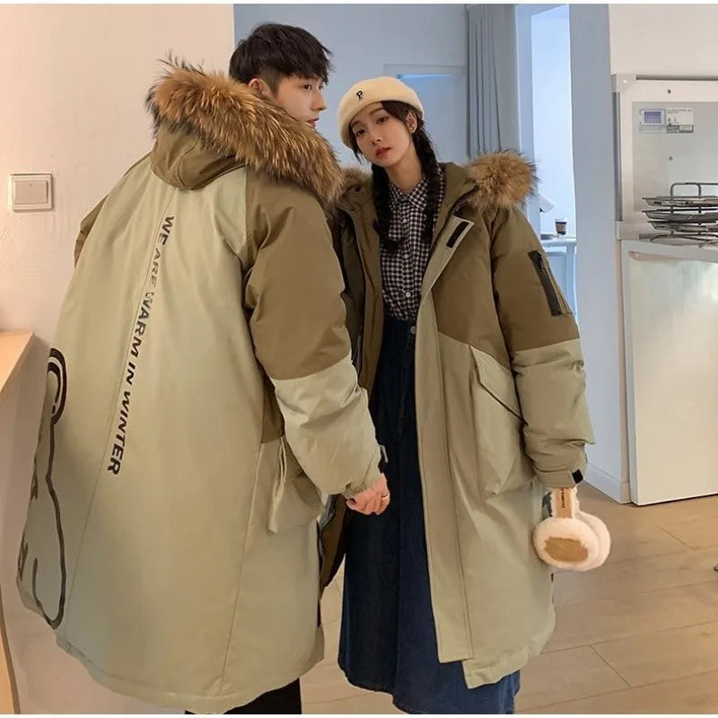 Doudoune longue unisexe bicolore kaki et beige avec capuche à fausse fourrure