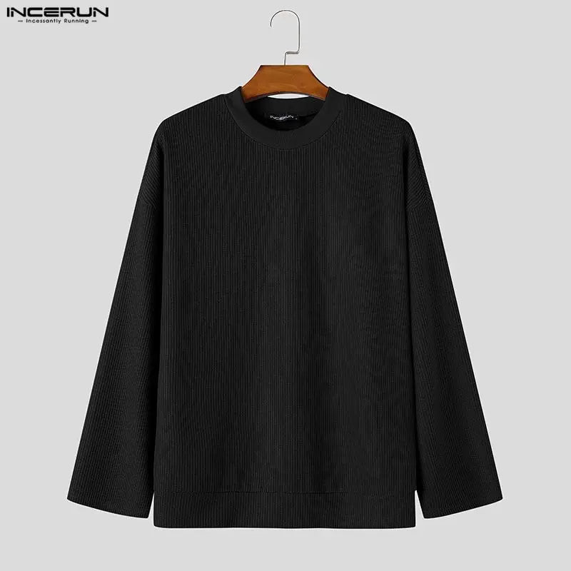 Men's loose-fit black ribbed crew-neck sweater with long sleeves