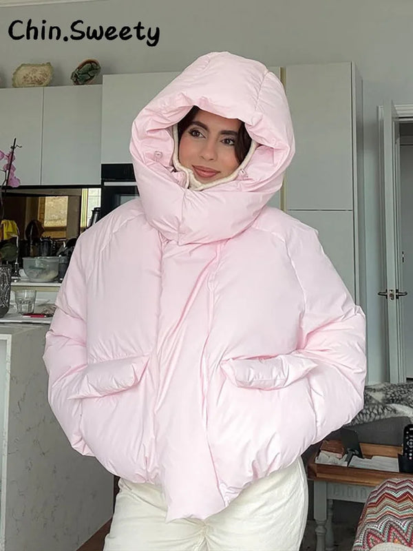 Kurze Damen-Steppjacke mit weiter Kapuze und Stehkragen in Hellrosa