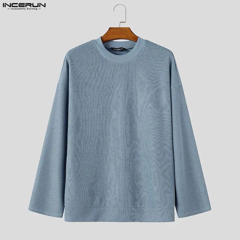 Men's loose-fit black ribbed crew-neck sweater with long sleeves