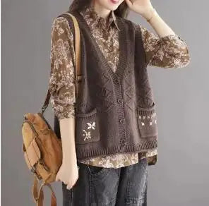 Women's open-knit sleeveless vest with V-neck, buttons, and floral embroidery