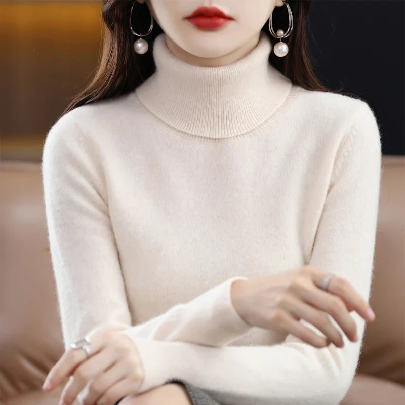 Jersey de mujer de cuello vuelto y mangas largas en color liso