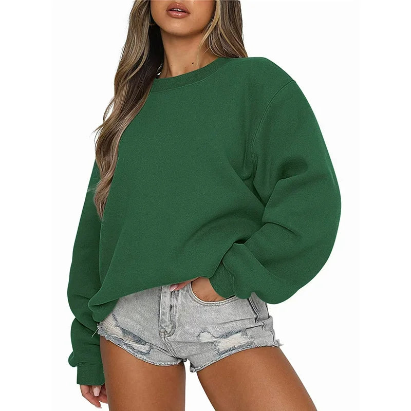 Ensfarvet, løstsiddende sweatshirt til kvinder med rund hals og lange ærmer