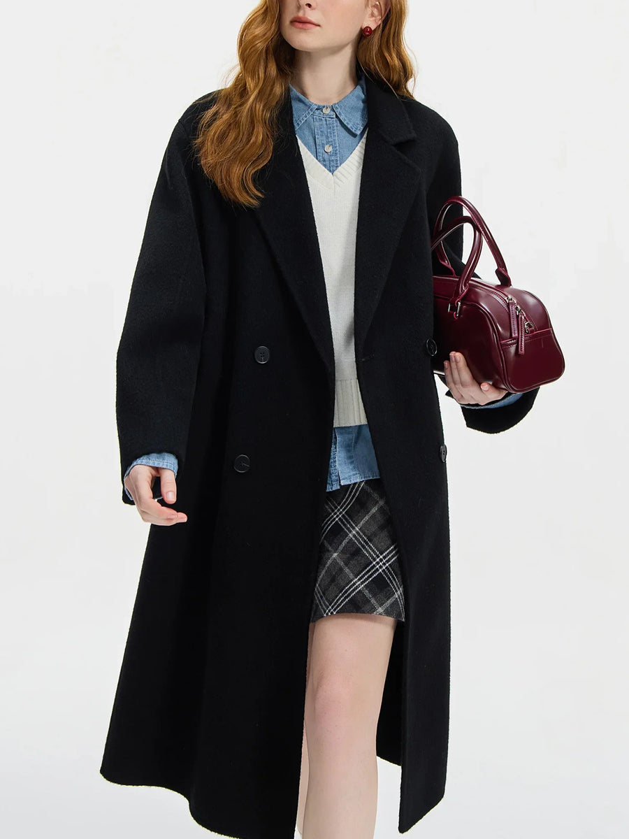 Women's straight-cut, double-breasted wrap coat in a solid color