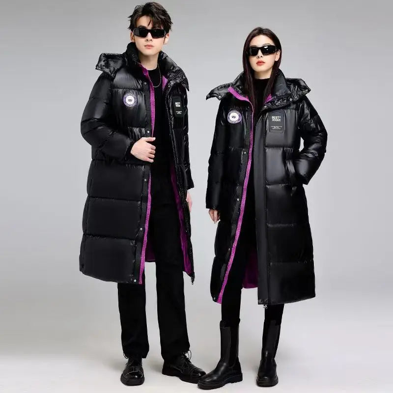 Plumífero largo negro acolchado unisex con capucha